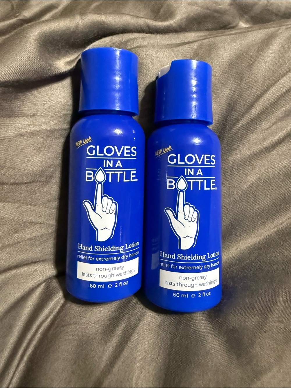 New Gloves In A Bottle Shielding Lotion For Hands And Body, 2 Oz 60ml. 
2 unused